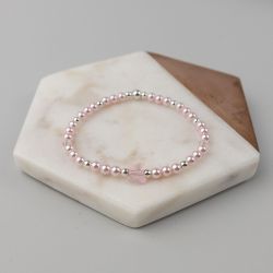 Розова гривна с кристални перли Swarovski и пеперуда